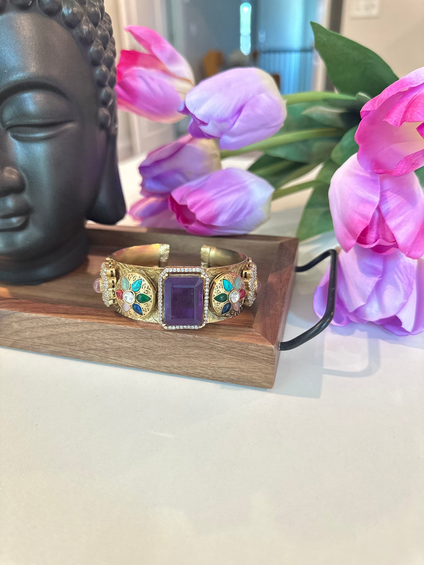 Beautiful Floral Gold Polished Bracelet with Blue Stone Studded