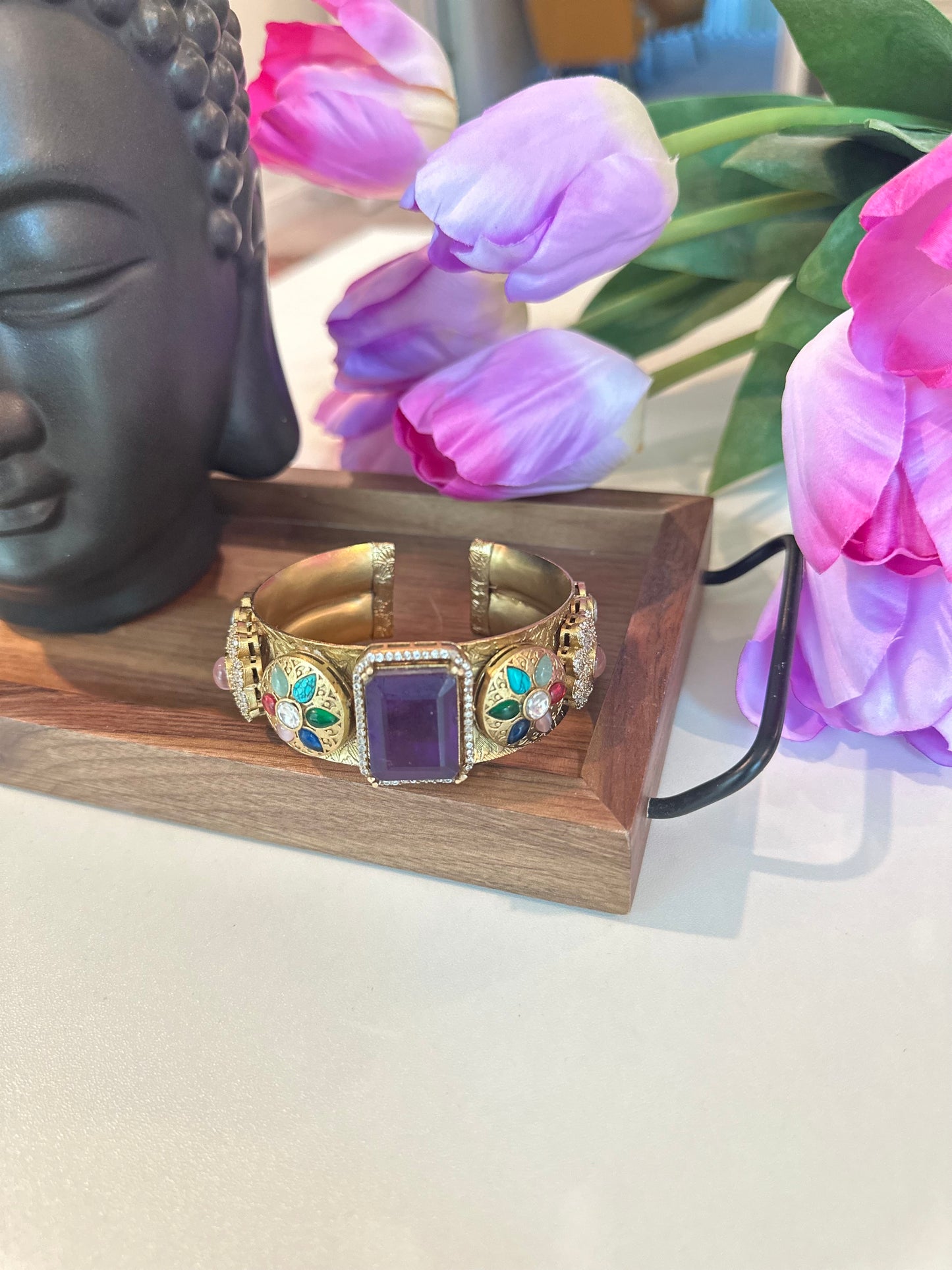 Beautiful Floral Gold Polished Bracelet with Blue Stone Studded